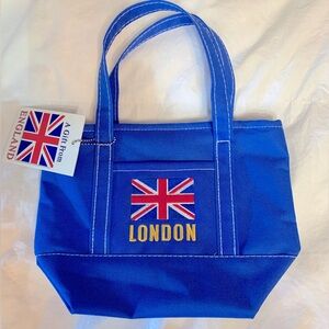 Small blue Zip Purse. make-up bag. NEW. London.